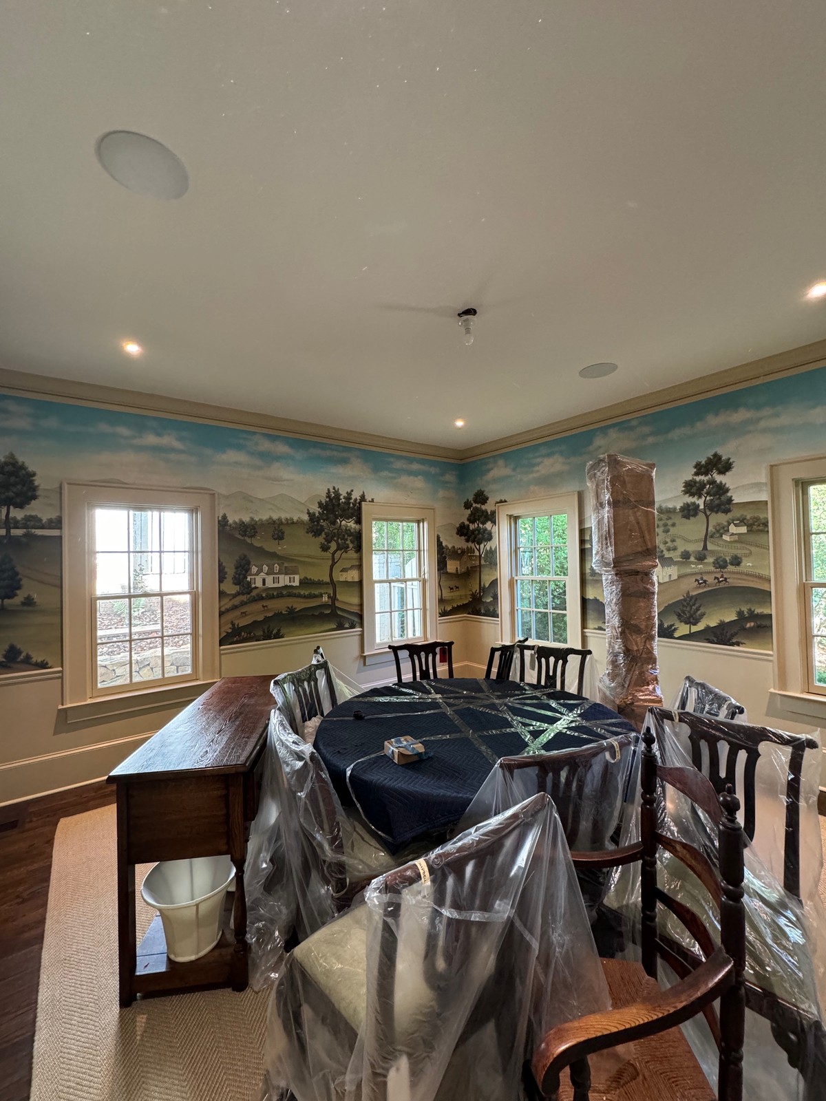 Gracie handpainted wallcovering installation in formal dining room