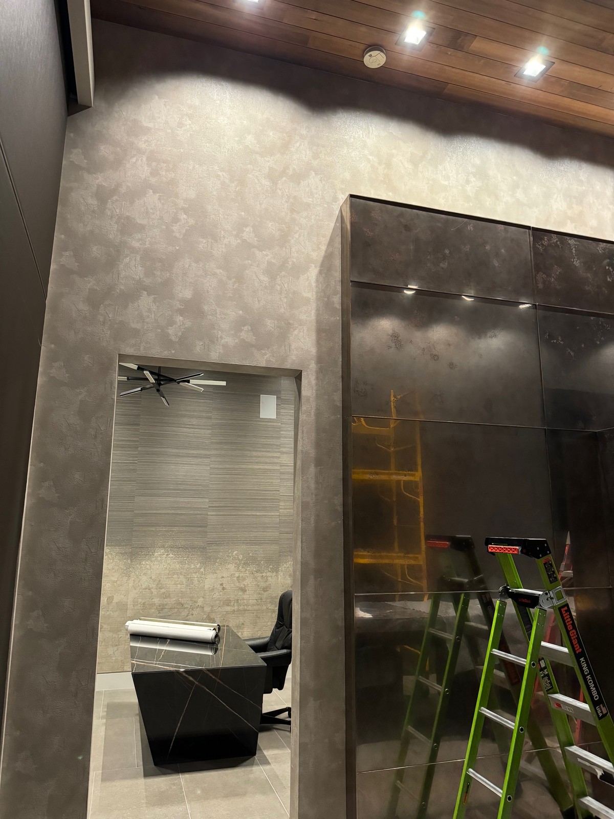 Foyer and office with coordinating designer wallcovering installation