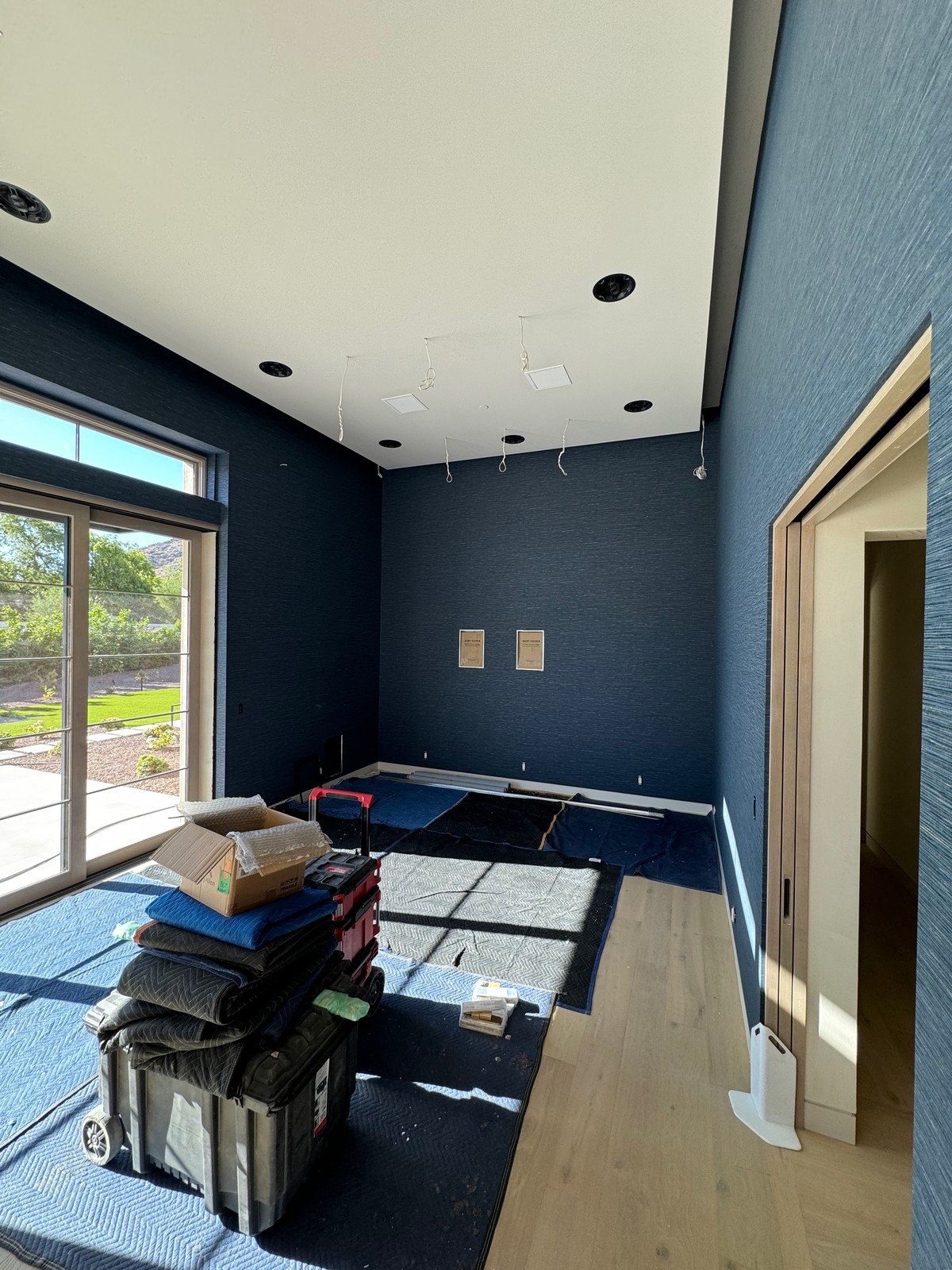 Theater room with Momentum vinyl grasscloth wallcovering installation