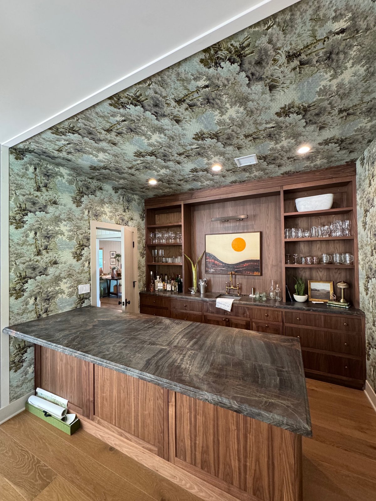 Gucci foliage wallcovering professionally installed on bar walls and ceiling