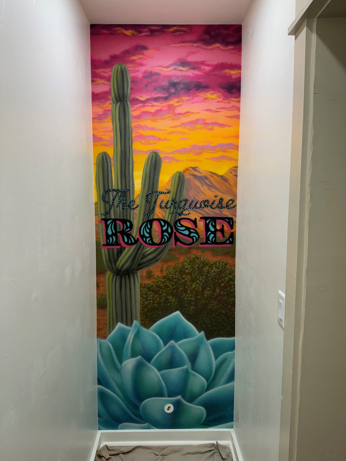 Completed custom mural professionally installed on accent wall