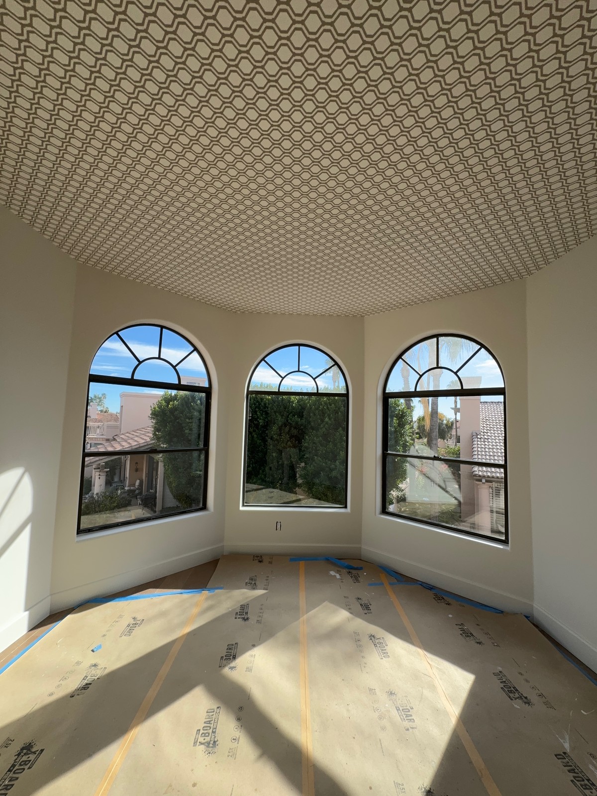 Geometric wallcovering installed on octagonal room ceiling